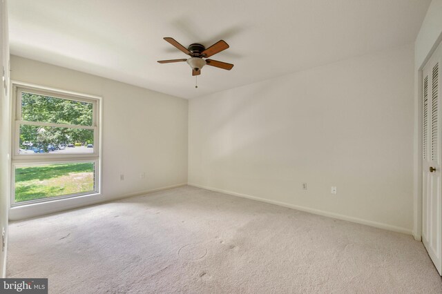 3360 Gleneagles Dr Unit 71-2B, Silver Spring, MD 20906 - unfurnished bedroom with carpet, a closet, and ceiling fan