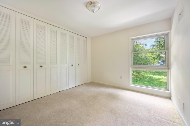 3360 Gleneagles Dr Unit 71-2B, Silver Spring, MD 20906 - unfurnished bedroom with carpet flooring and a closet