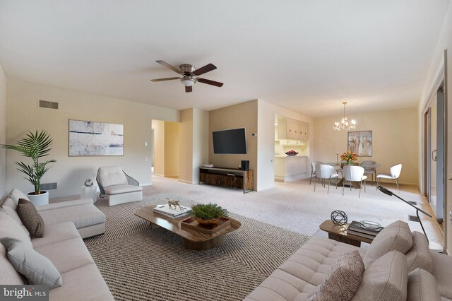 3360 Gleneagles Dr Unit 71-2B, Silver Spring, MD 20906 - living area featuring a chandelier, light carpet, and ceiling fan
