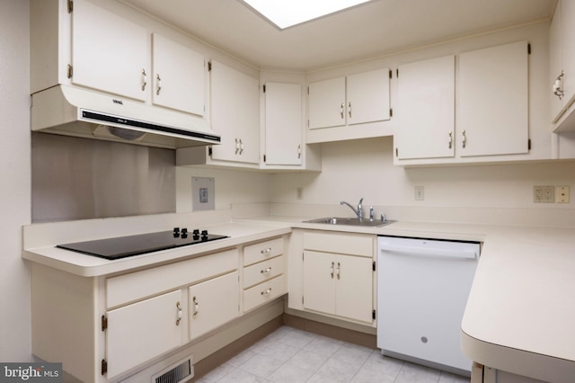 3360 Gleneagles Dr Unit 71-2B, Silver Spring, MD 20906 - kitchen with white dishwasher, under cabinet range hood, black electric cooktop, and light countertops