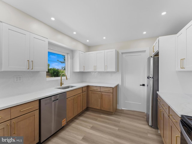 103 Hillcrest Ln, Willingboro, NJ 08046 - kitchen with appliances with stainless steel finishes, white cabinetry, light wood-style floors, backsplash, and recessed lighting