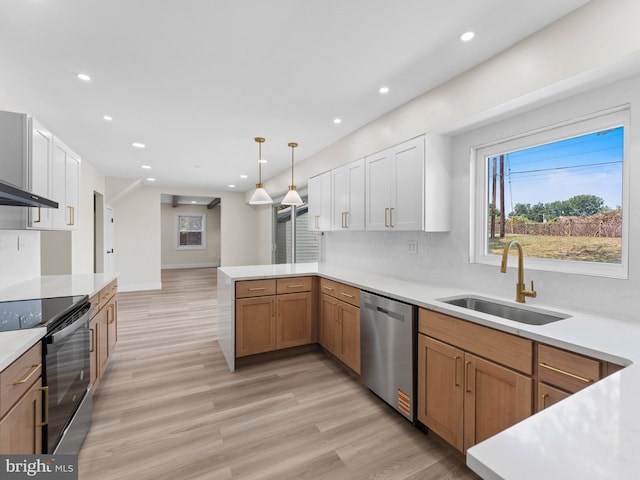 103 Hillcrest Ln, Willingboro, NJ 08046 - kitchen featuring stainless steel appliances, a peninsula, light countertops, and recessed lighting