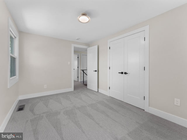 103 Hillcrest Ln, Willingboro, NJ 08046 - unfurnished bedroom with carpet flooring and a closet
