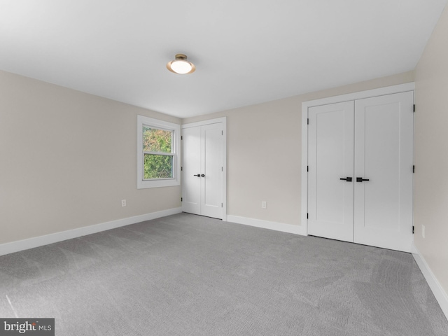 103 Hillcrest Ln, Willingboro, NJ 08046 - unfurnished bedroom featuring multiple closets and carpet floors