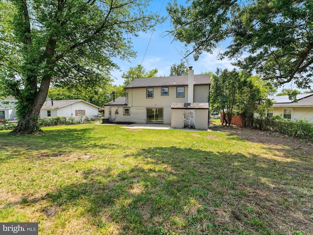 103 Hillcrest Ln, Willingboro, NJ 08046 - rear view of property with a patio area and a chimney