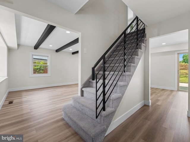 103 Hillcrest Ln, Willingboro, NJ 08046 - stairway with healthy amount of natural light, wood finished floors, beam ceiling, and recessed lighting