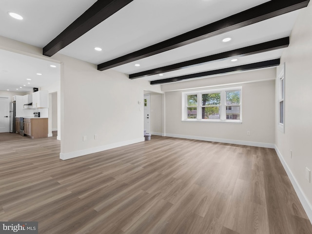 103 Hillcrest Ln, Willingboro, NJ 08046 - unfurnished living room featuring light wood-type flooring, beam ceiling, and recessed lighting