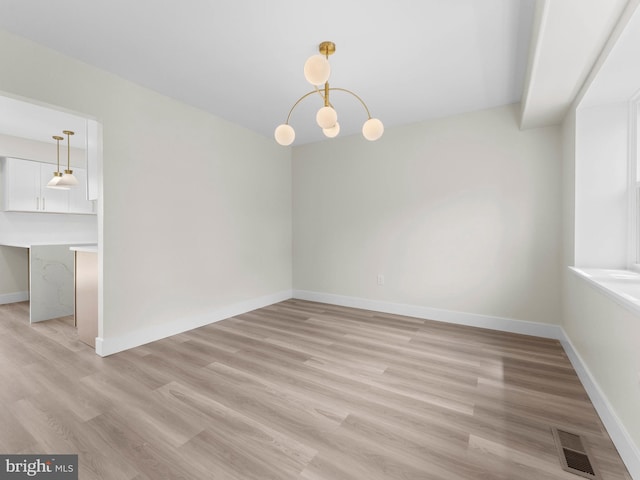 103 Hillcrest Ln, Willingboro, NJ 08046 - unfurnished dining area featuring light wood-type flooring and baseboards