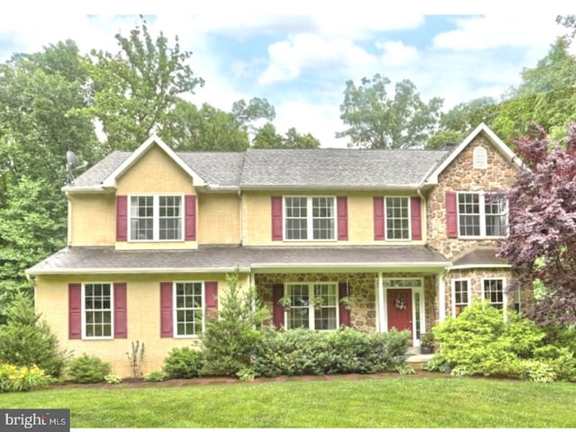 3044 Chestnut Hill Rd, Pottstown, PA 19465 - traditional home featuring a front lawn and stone siding
