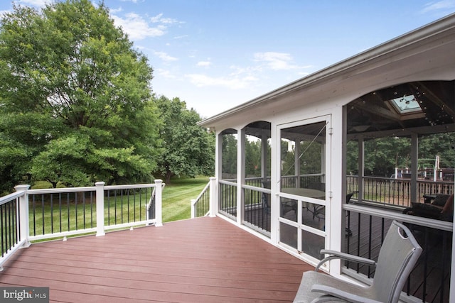 43076 Stonecottage Pl, Ashburn, VA 20147 - wooden deck featuring a sunroom and a lawn