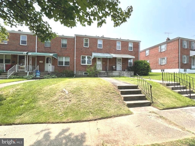 8544 Willow Oak Rd, Parkville, MD 21234 - view of property featuring brick siding and a front yard