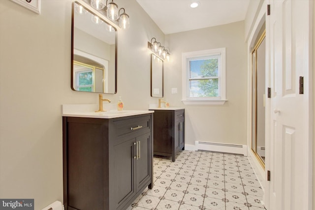 2540 Stoney Point Rd, East Berlin, PA 17316 - full bath featuring a baseboard radiator, a stall shower, two vanities, and tile patterned floors