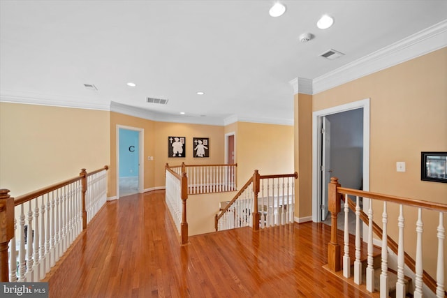 43146 Scenic Creek Way, Leesburg, VA 20176 - hall with an upstairs landing, light wood-style floors, recessed lighting, and crown molding