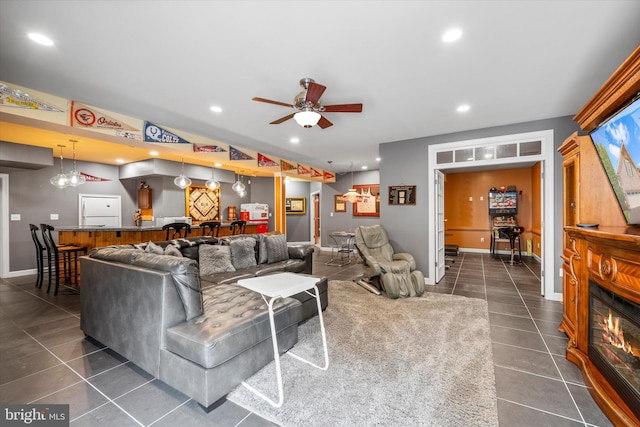 43146 Scenic Creek Way, Leesburg, VA 20176 - living room featuring dark tile patterned flooring, bar area, recessed lighting, and ceiling fan