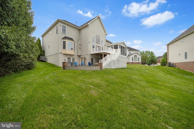 43146 Scenic Creek Way, Leesburg, VA 20176 - back of property with stairway, a wooden deck, and a lawn