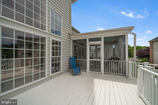 43146 Scenic Creek Way, Leesburg, VA 20176 - wooden deck featuring a sunroom