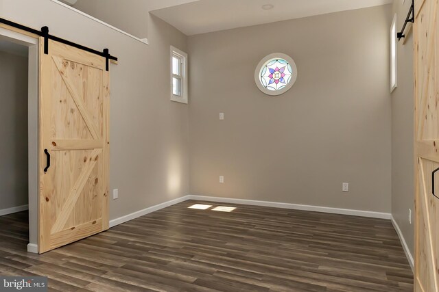 301 Nicholson Rd, Gloucester City, NJ 08030 - foyer with a barn door and dark wood finished floors