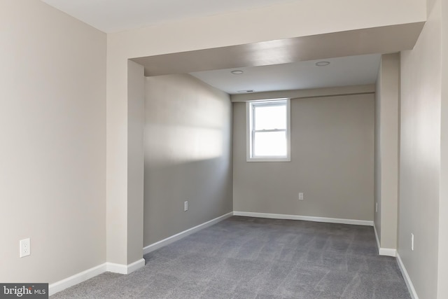 301 Nicholson Rd, Gloucester City, NJ 08030 - empty room featuring dark carpet and baseboards