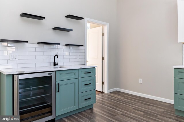 301 Nicholson Rd, Gloucester City, NJ 08030 - indoor wet bar featuring beverage cooler, dark wood-style flooring, and tasteful backsplash