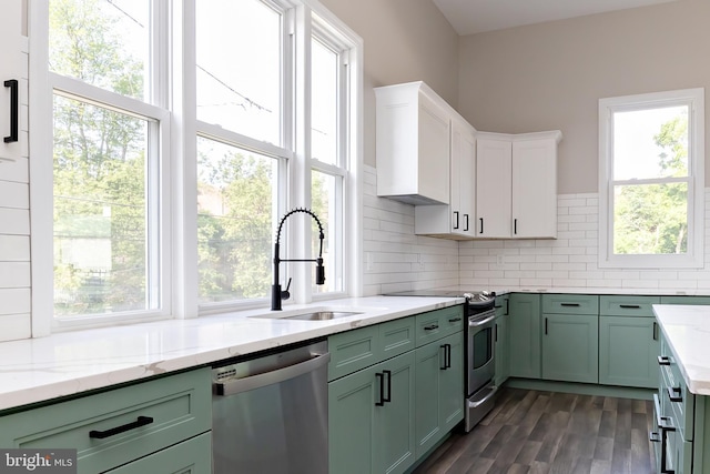 301 Nicholson Rd, Gloucester City, NJ 08030 - kitchen with stainless steel appliances, green cabinets, and healthy amount of natural light