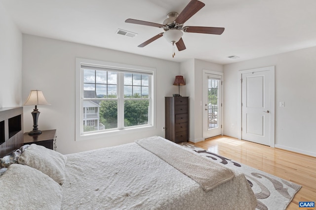 2126 Sundown Pl, Charlottesville, VA 22911 - bedroom featuring wood finished floors, access to exterior, and ceiling fan