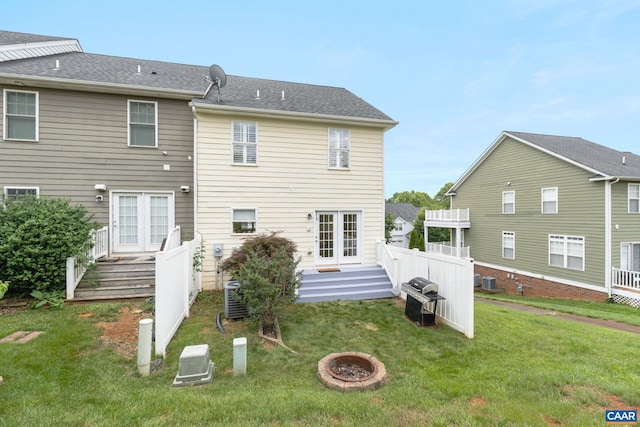 2126 Sundown Pl, Charlottesville, VA 22911 - rear view of house with a yard, an outdoor fire pit, and french doors