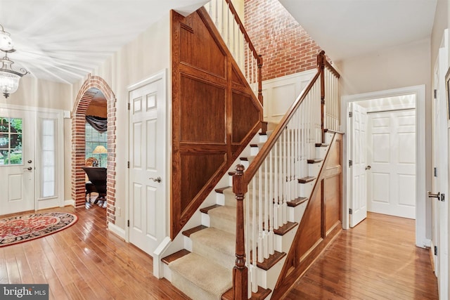 176 Windgate Dr, Chester Springs, PA 19425 - stairway with hardwood / wood-style floors and a chandelier