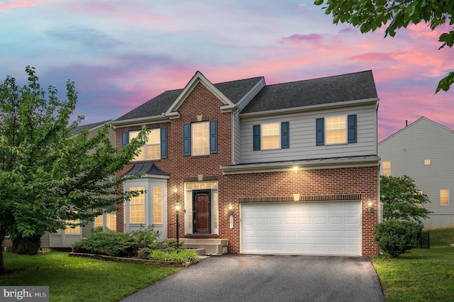 1201 Preserve Ln, Fredericksburg, VA 22401 - colonial house with a garage, driveway, brick siding, and a front yard