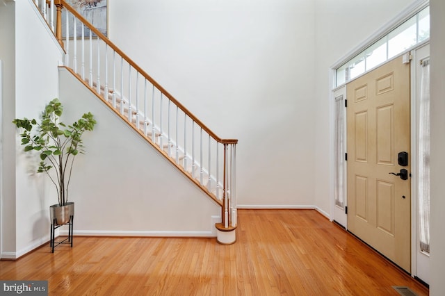 1201 Preserve Ln, Fredericksburg, VA 22401 - foyer entrance featuring wood finished floors, stairway, and a towering ceiling