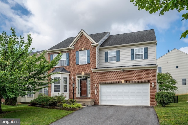 1201 Preserve Ln, Fredericksburg, VA 22401 - view of front facade featuring driveway, an attached garage, brick siding, and a front lawn