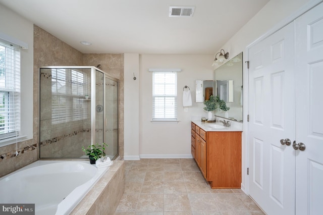 1201 Preserve Ln, Fredericksburg, VA 22401 - bathroom with vanity, a bath, a stall shower, and tile patterned floors