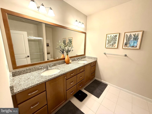 23245 Milltown Knoll Sq Unit 103, Ashburn, VA 20148 - full bathroom with double vanity, a shower stall, and tile patterned flooring