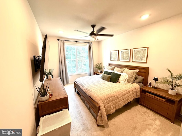 23245 Milltown Knoll Sq Unit 103, Ashburn, VA 20148 - bedroom featuring light colored carpet and ceiling fan