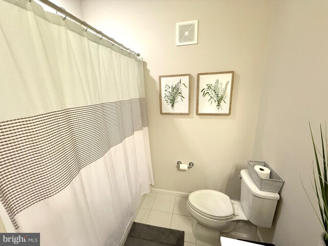 23245 Milltown Knoll Sq Unit 103, Ashburn, VA 20148 - bathroom featuring tile patterned floors and curtained shower