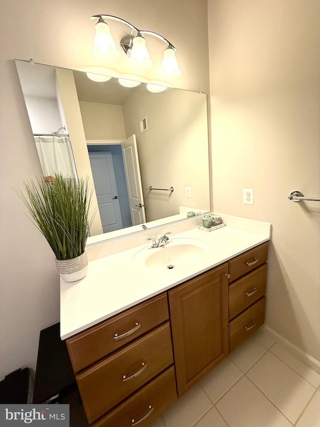 23245 Milltown Knoll Sq Unit 103, Ashburn, VA 20148 - full bath with vanity and tile patterned floors