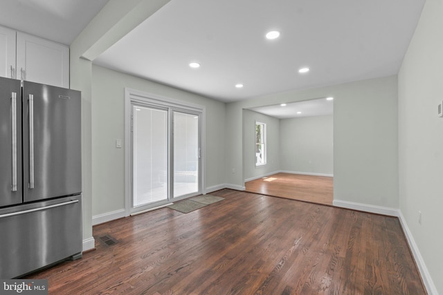 7724 Central Ave, Pasadena, MD 21122 - unfurnished living room featuring dark wood finished floors and recessed lighting