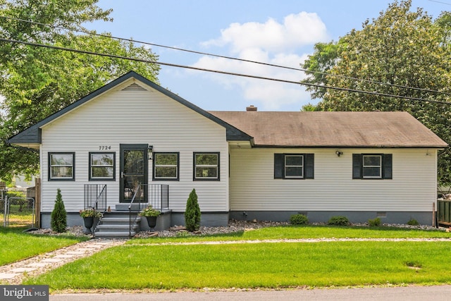 7724 Central Ave, Pasadena, MD 21122 - view of front facade with a front yard, crawl space, and a shingled roof
