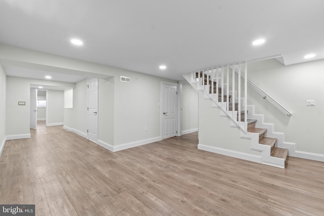 7724 Central Ave, Pasadena, MD 21122 - finished basement featuring stairs, wood finished floors, and recessed lighting