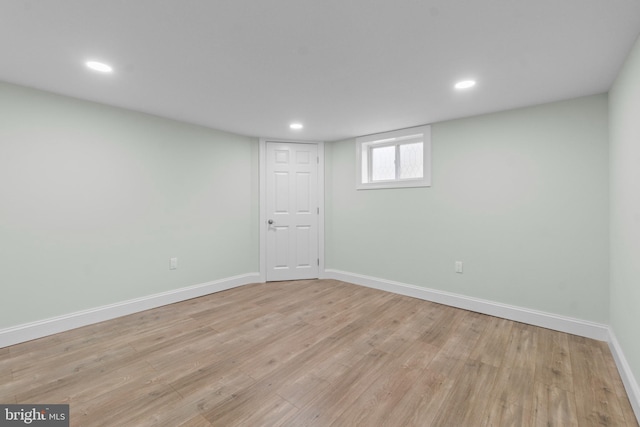 7724 Central Ave, Pasadena, MD 21122 - below grade area featuring light wood finished floors and recessed lighting