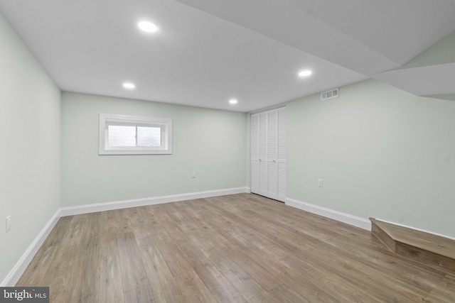 7724 Central Ave, Pasadena, MD 21122 - below grade area with wood finished floors and recessed lighting