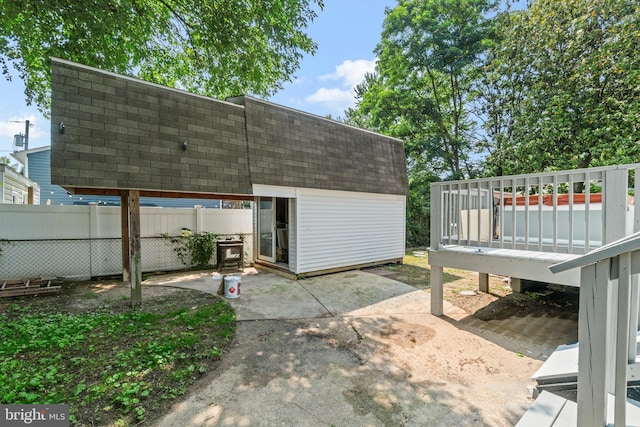 7724 Central Ave, Pasadena, MD 21122 - view of yard featuring a patio, a wooden deck, and a shed
