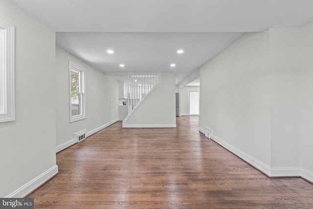 7724 Central Ave, Pasadena, MD 21122 - unfurnished room with stairs, wood finished floors, and recessed lighting