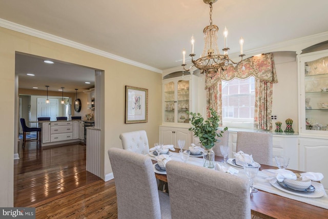 620 Laurel Rd, Springfield, PA 19064 - dining space featuring a chandelier, ornamental molding, and dark wood-style floors