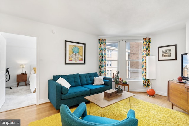 915 E St NW Unit 1103, Washington, DC 20004 - living area with wood finished floors and baseboards