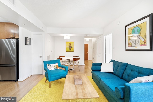 915 E St NW Unit 1103, Washington, DC 20004 - living room featuring light wood finished floors