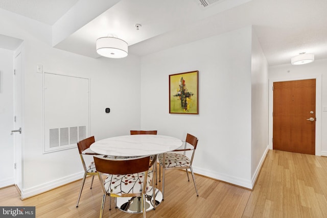 915 E St NW Unit 1103, Washington, DC 20004 - dining room featuring light wood finished floors