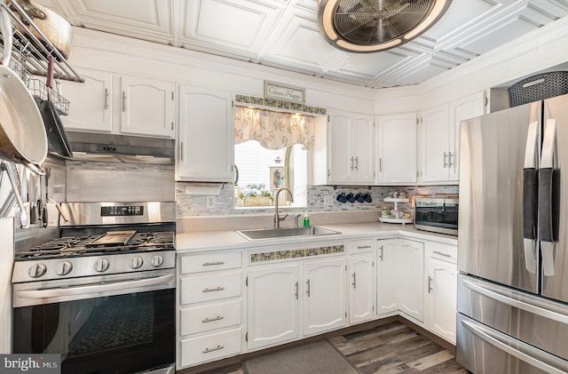 1815 Belle Ave, Dundalk, MD 21222 - kitchen with appliances with stainless steel finishes, decorative backsplash, white cabinetry, light countertops, and an ornate ceiling