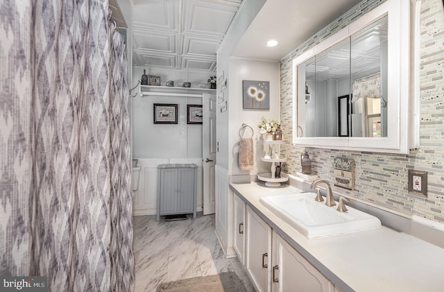 1815 Belle Ave, Dundalk, MD 21222 - bathroom with double vanity, marble look tile flooring, an ornate ceiling, and recessed lighting