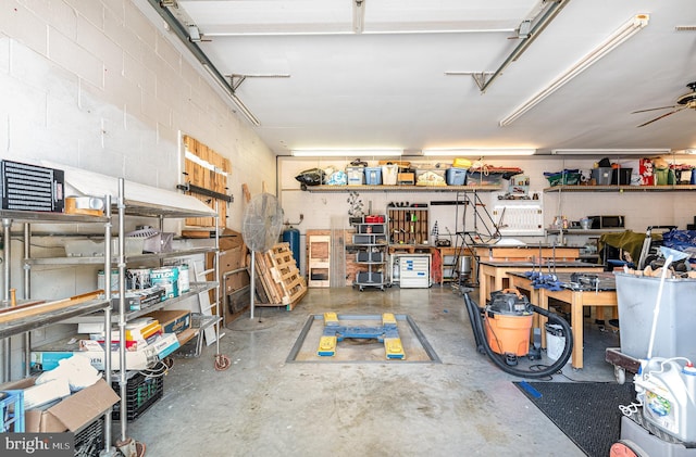 1815 Belle Ave, Dundalk, MD 21222 - garage with concrete block wall and a workshop area