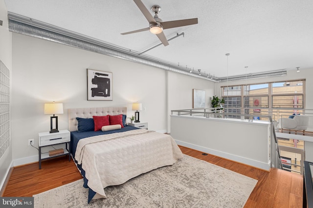 1390 Kenyon St NW Unit 524, Washington, DC 20010 - bedroom featuring wood finished floors